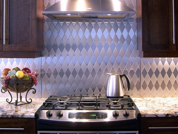 stainless steel backsplash harlequin pattern dark cabinets