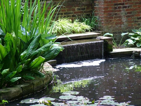 water pond large area nice brick wall garden water features