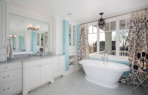 white bathroom blue accents small black-chandelier
