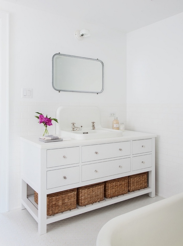 white-bathroom-vanity-with storage drawers and open shelf