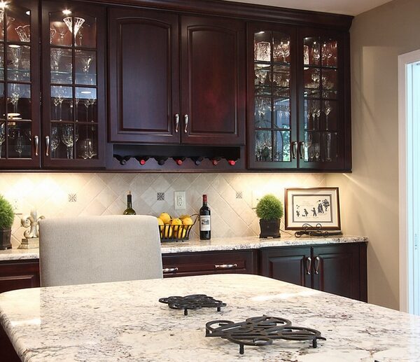 Bianco-Romano-granite-countertops-dark-kitchen-cabinets-contemporary-kitchen-ideas