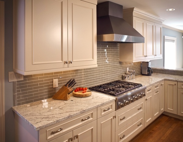 Bianco Romano kitchen granite countertops white cabinets wood floor