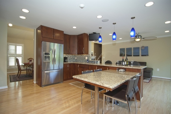 Contemporary kitchen design countertops wood flooring