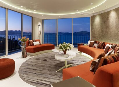 Modern-furniture-design-curved-sofa-sectional-round-area-rug-coffee-table
