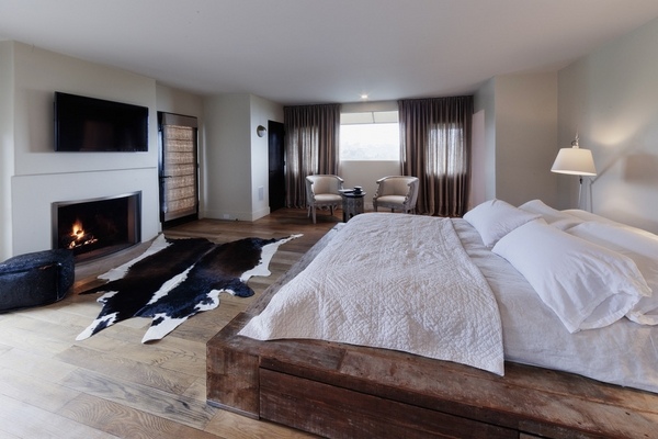 Rustic bedroom interior design rug fireplace
