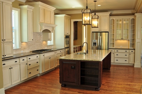 contemporary countertop white cabinets wood flooring