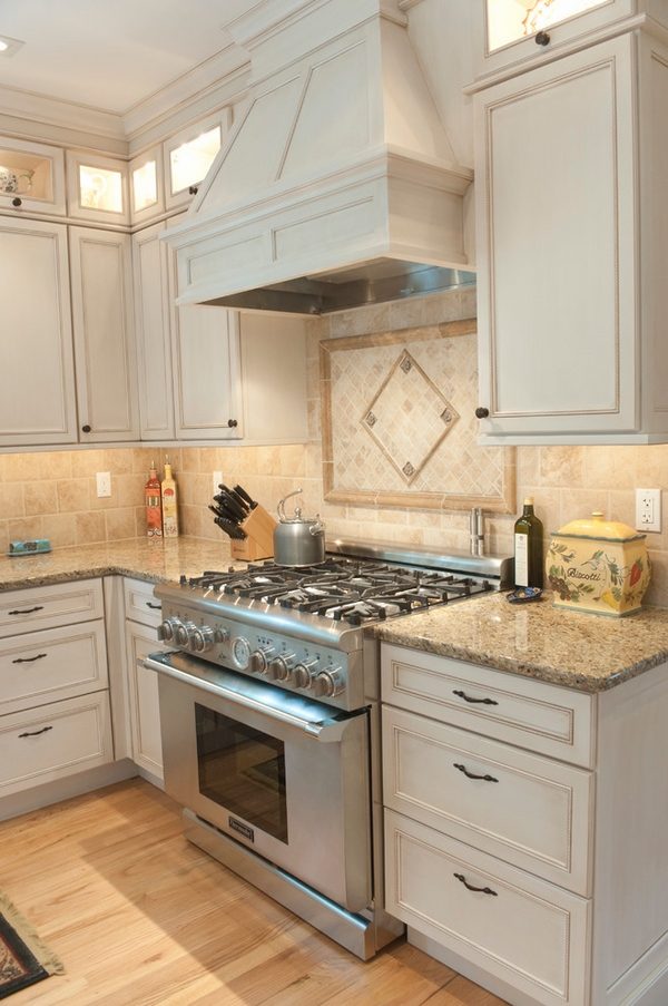 granite venetian gold white cabinets stainless steel gas oven 