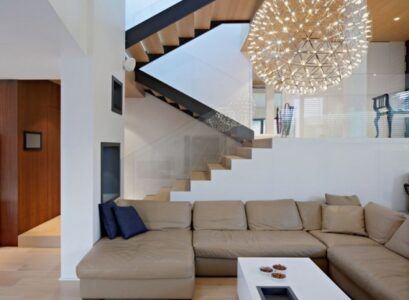 interior-design-ideas-leather-sectional-sofa-contemporary-chandelier