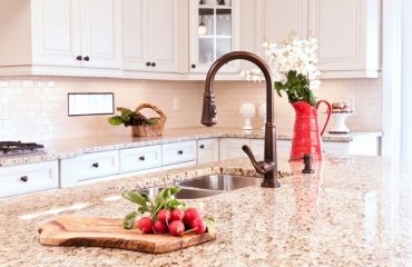 kitchen-remodel-Giallo-Ornamental-granite-countertops-white-cabinets