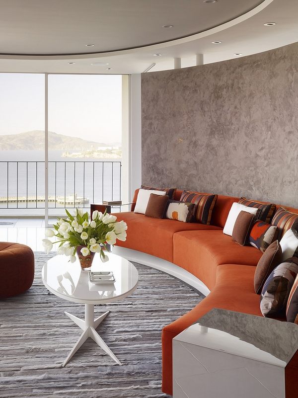 modern living room furniture ideas curved sofa orange decorative pillows