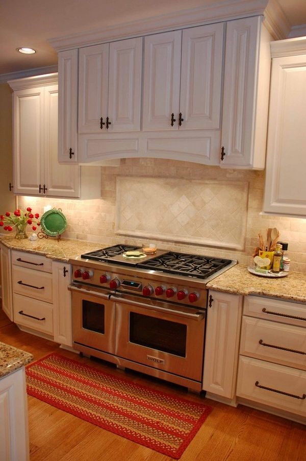  travertine backsplash white kitchen cabinets