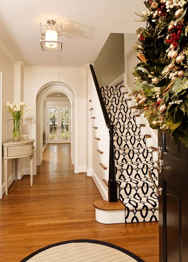 white brown carpet runner white stair railings