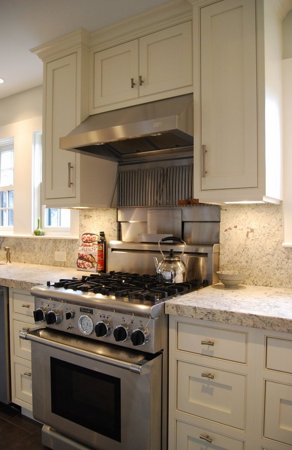 white cabinets granite countertop stainless steel oven