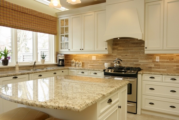 white kitchen Giallo Ornamental granite countertops white cabinets