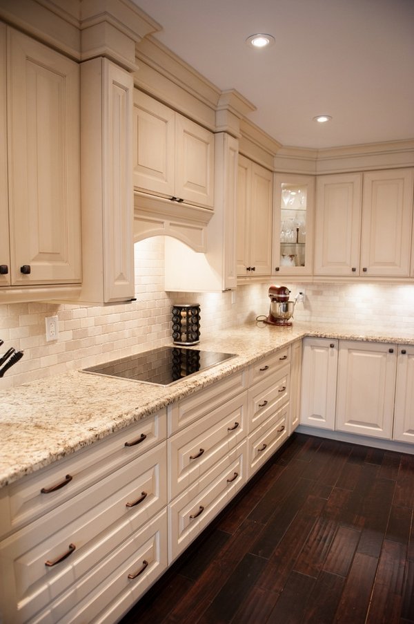 white-kitchen design Giallo Ornamental granite countertops white cabinets wood flooring