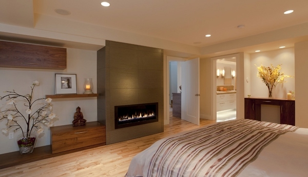 Contemporary-bedroom-design-gas-fireplace-wood-glooring