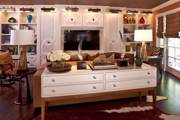 Family room credenza with storage drawers table lamps art display