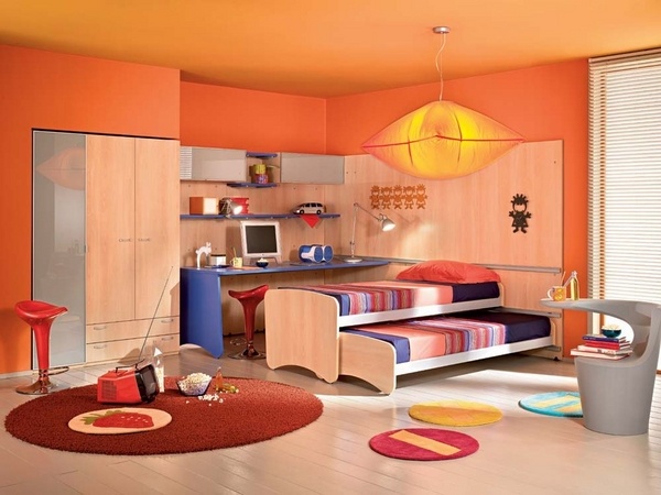 Modern kids bedroom furniture orange walls bed with trundle round area rugs