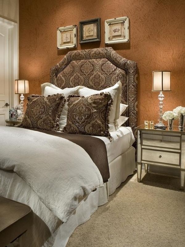 bed with high upholstered headboard ornaments wallpaper brown wall color