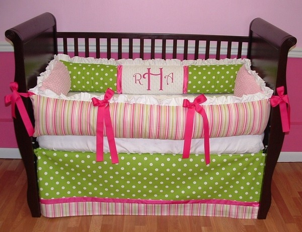 colorful green pink white wooden crib