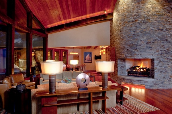 contemporary living room rustic style natural stone fireplace