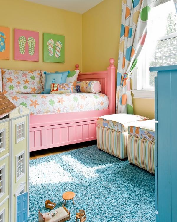 girls bedroom pink bed blue rug colorful curtains