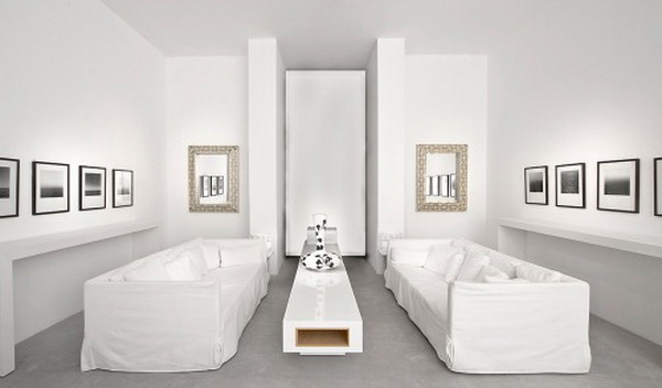 minimalist living room white covers gray flooring