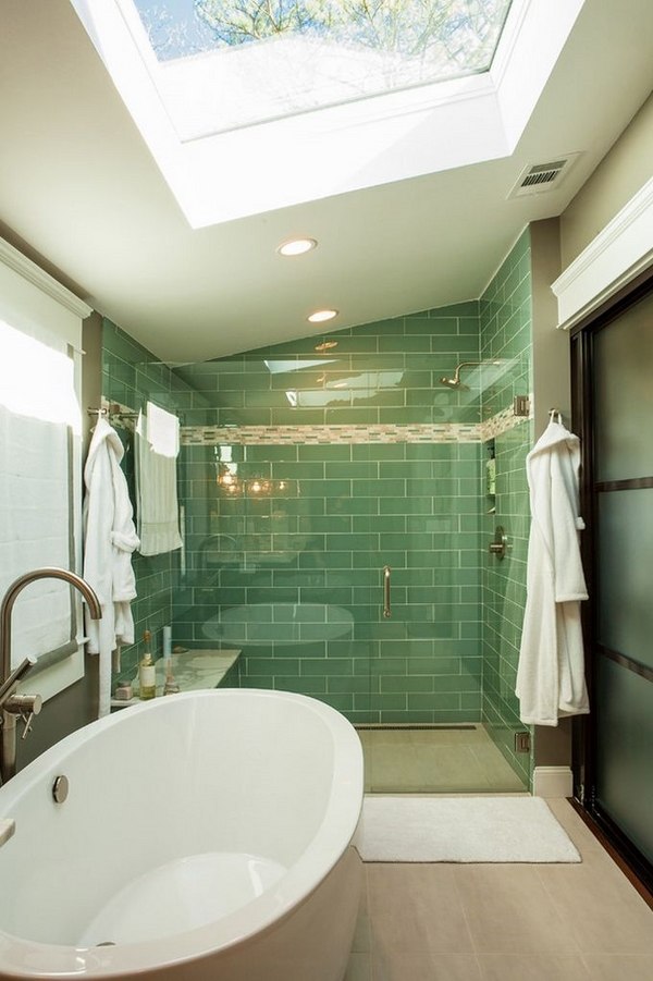 modern bathroom attic frameless doors green tiles freestanding bathtub