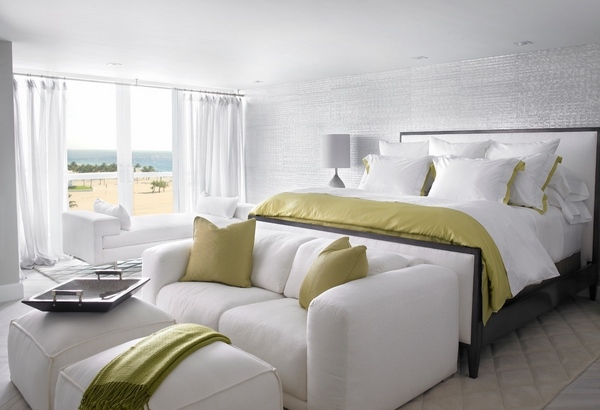 modern bedroom white sofa stools mustard color accents