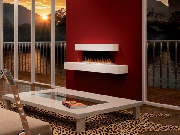 small decorative fireplace red wall white furniture