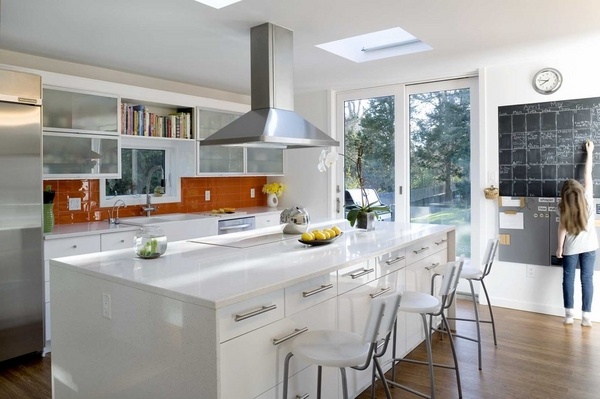 white kitchen cabinets countertop orange backsplash accent color