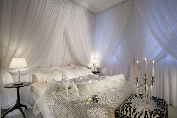 white luxury bedding romantic master bedroom interior design