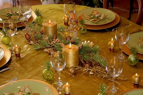 Christmas table decorations gold green colors pillar candles branches 