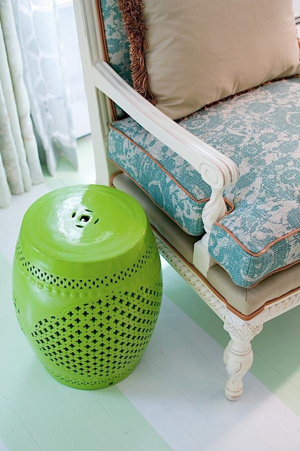 beautiful green ceramic stool as a side table