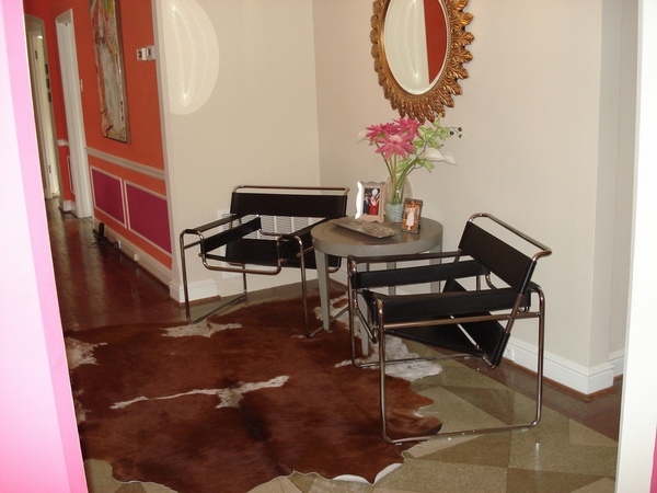  hallway furniture armchair small table cowhide rug