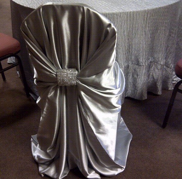 dining-chair-drapery-silver satin festive table decoration