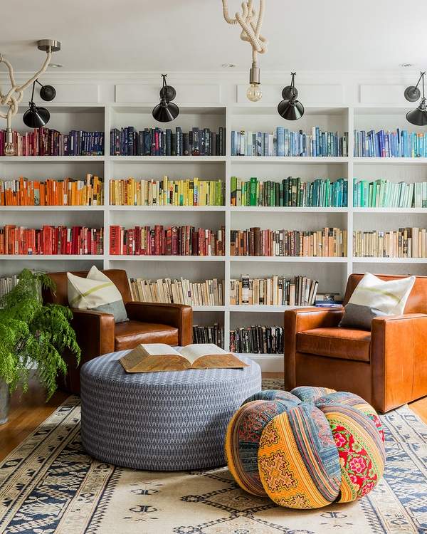 family room furniture pouf ottoman armchairs bookshelves