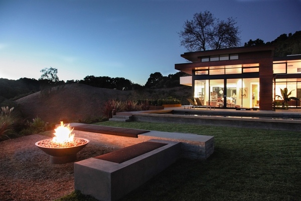landscape design modern home patio round fire