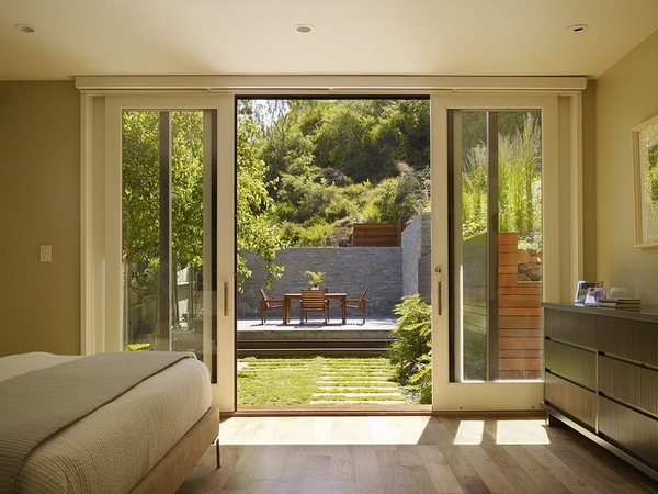 modern bedroom sliding doors patio access