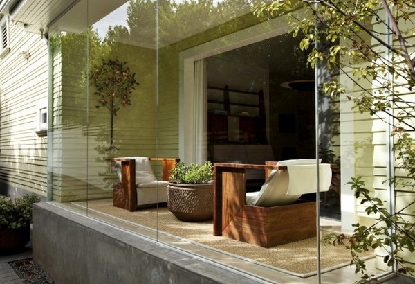 modern sunroom design glass walls contemporary furniture