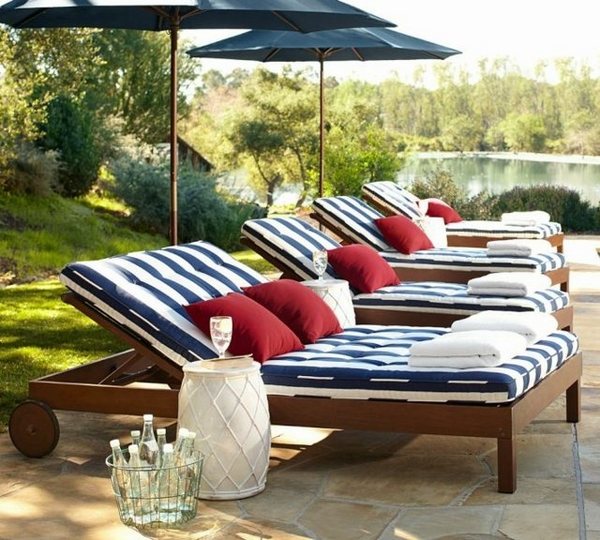 modern wooden chaise lounge chairs white blue stripes cushions pool area furniture
