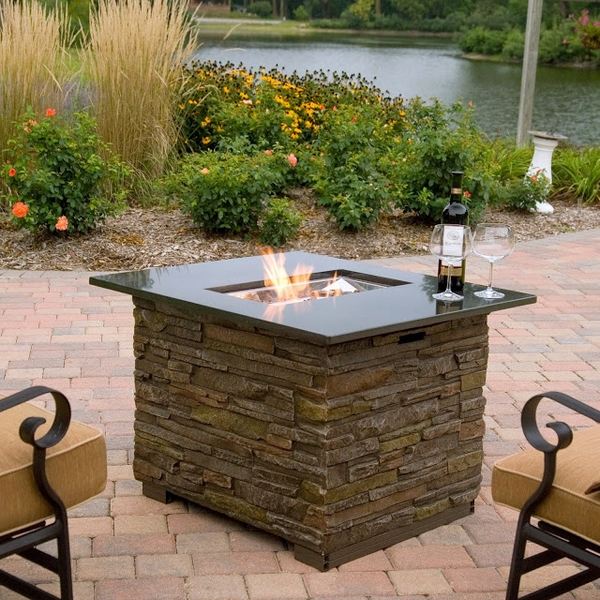 outdoor fireplace ideas fire table natural stone marble