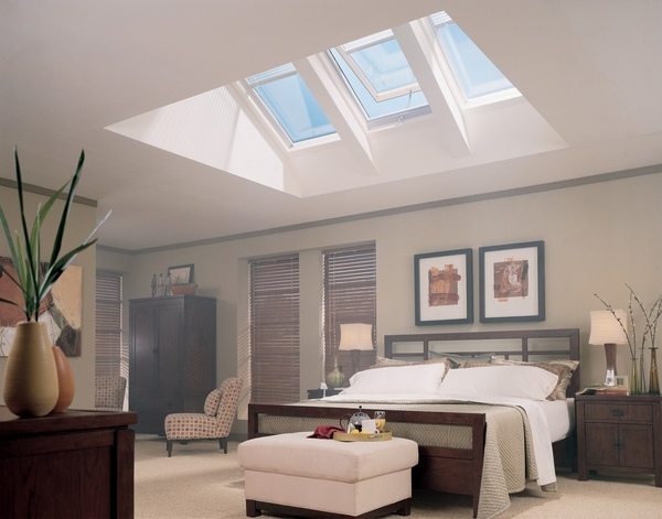 sloping ceiling skylights roofing decor master bedroom modern furnishing