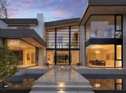 Modern-house-design-exterior-glass-front-door-koi-pond