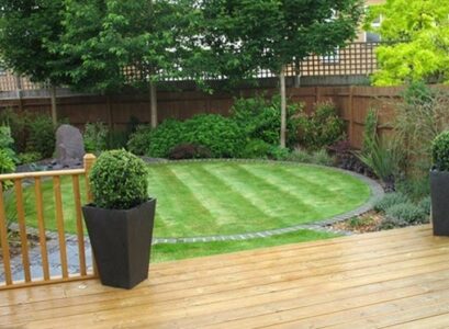 adorable-small-garden-ideas-wooden-deck-round-lawn-shrubs