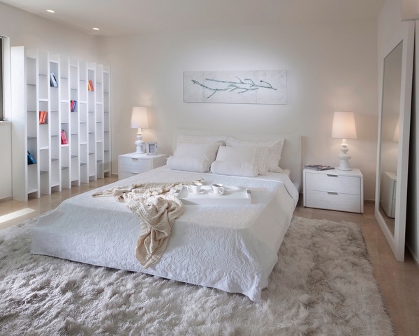 contemporary white bedroom white side tables shaggy rug
