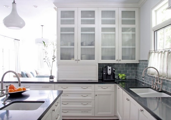 glass front cabinets design black countertops