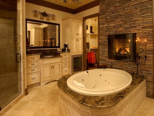 natural stone wall fireplace round tub