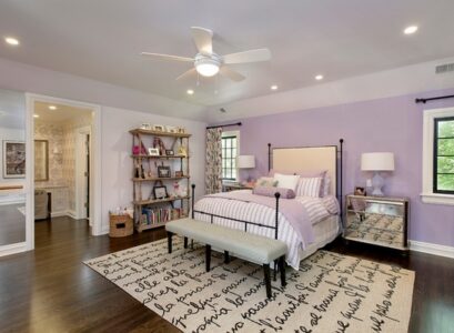 original-bedroom-area-rug-poster-bed-hardwood-floor