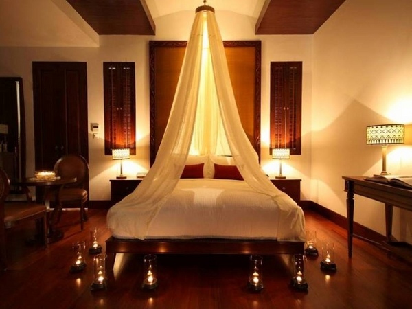 romantic design canopy bed soft ambient lighting candles